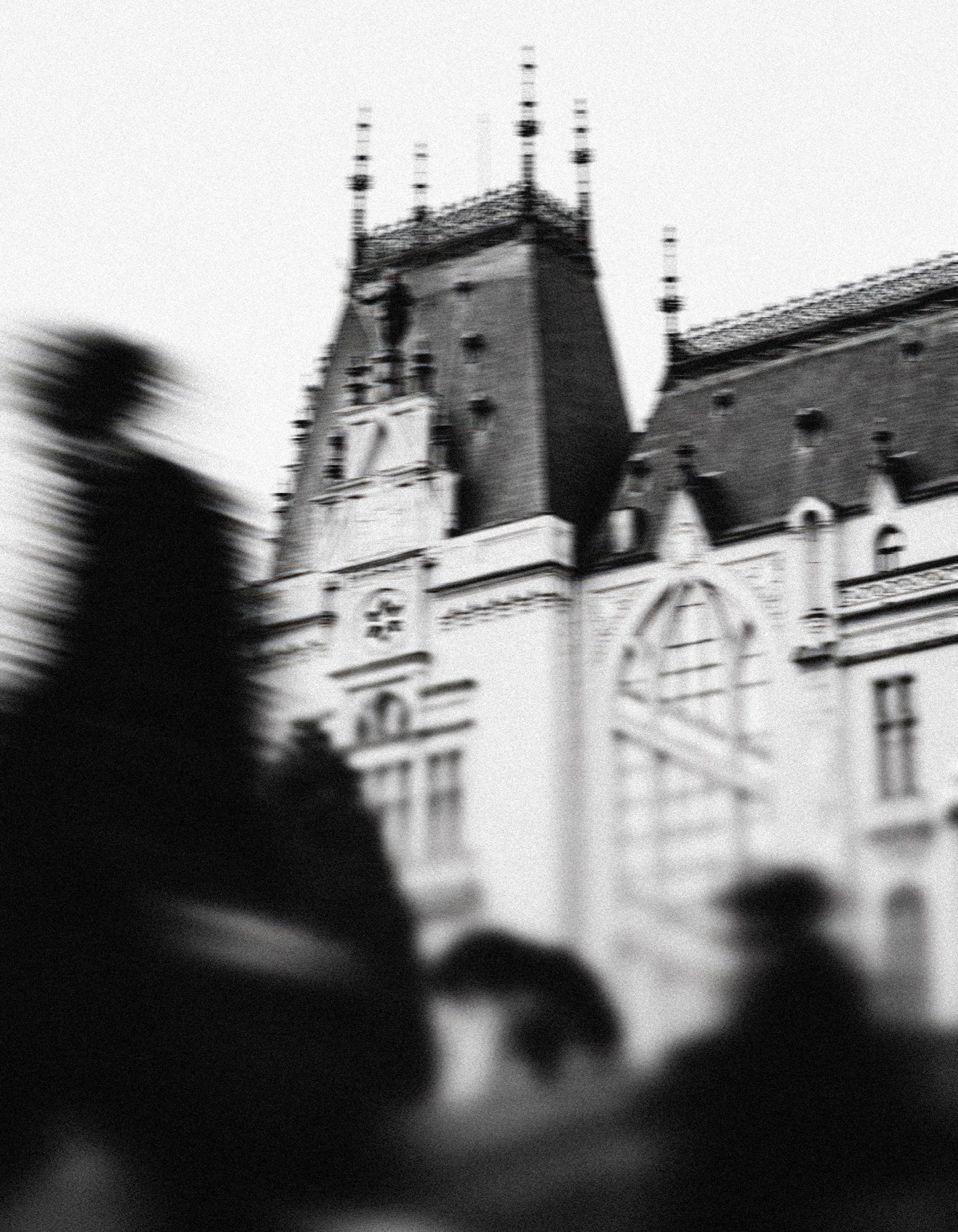 The Palace of Culture in Iași, with passers-by blurred in motion