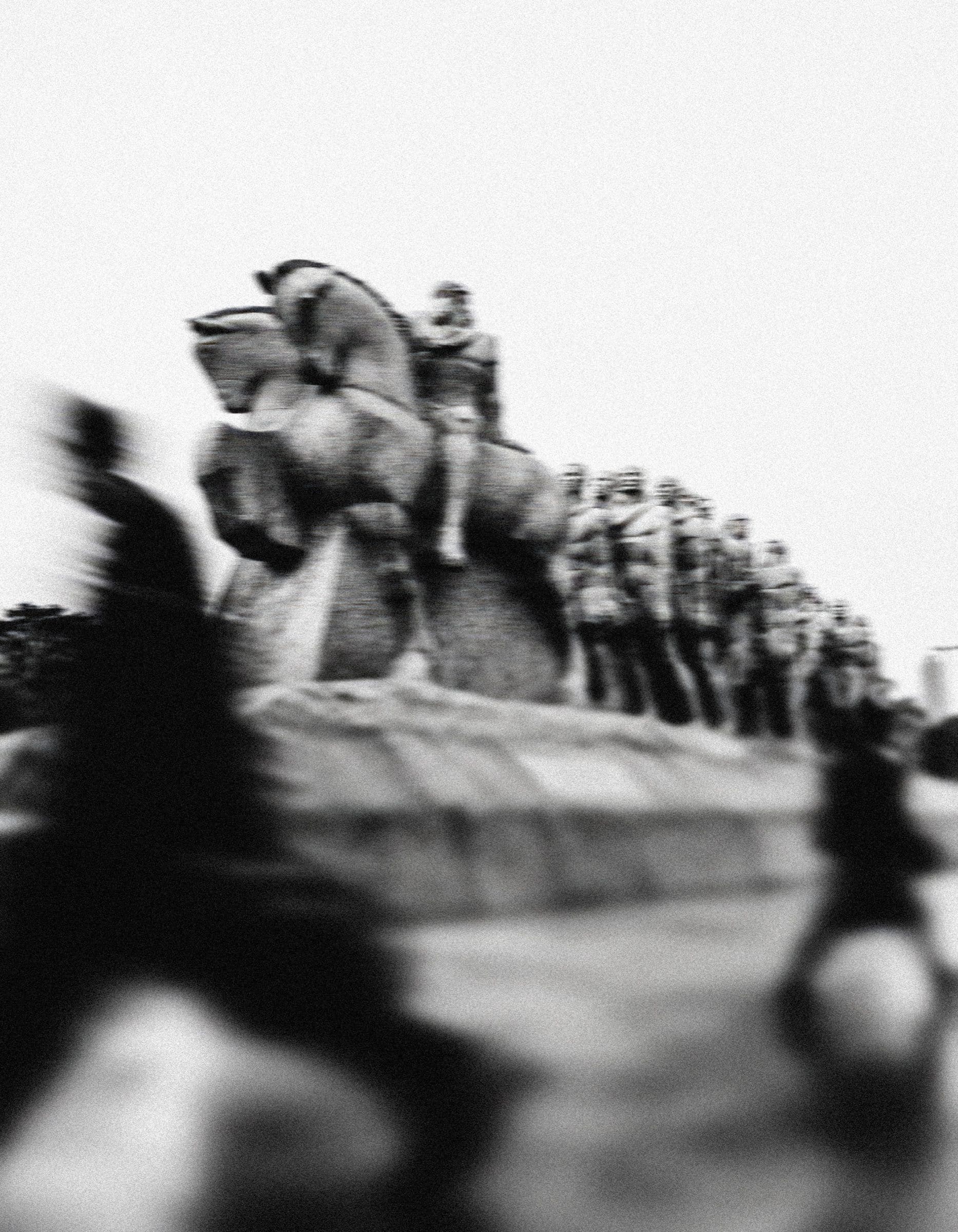 The Monumento às Bandeiras in São Paulo, with passers-by blurred in motion