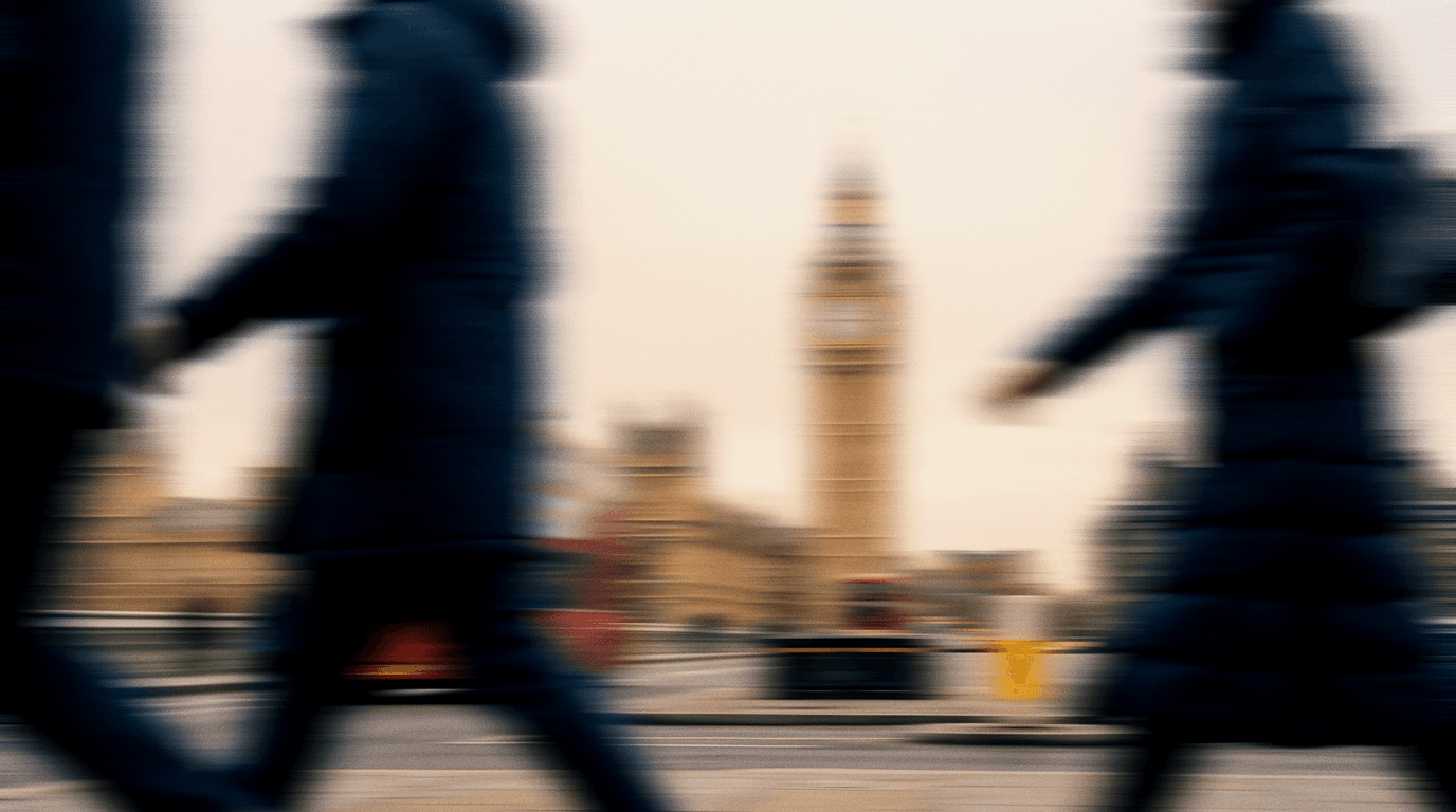 Commuters passing Big Ben in London, blurred in motion