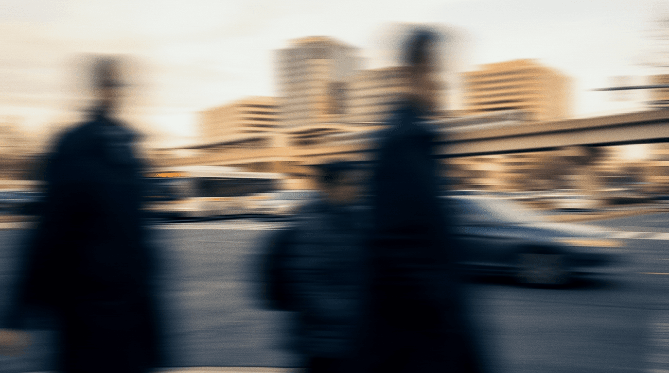 Commuters on a street in the Washington, D.C. area, blurred in motion